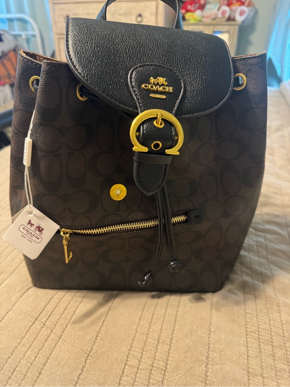 Coach Brown Signature Drawstring Backpack with Black Trim and Gold Hardware